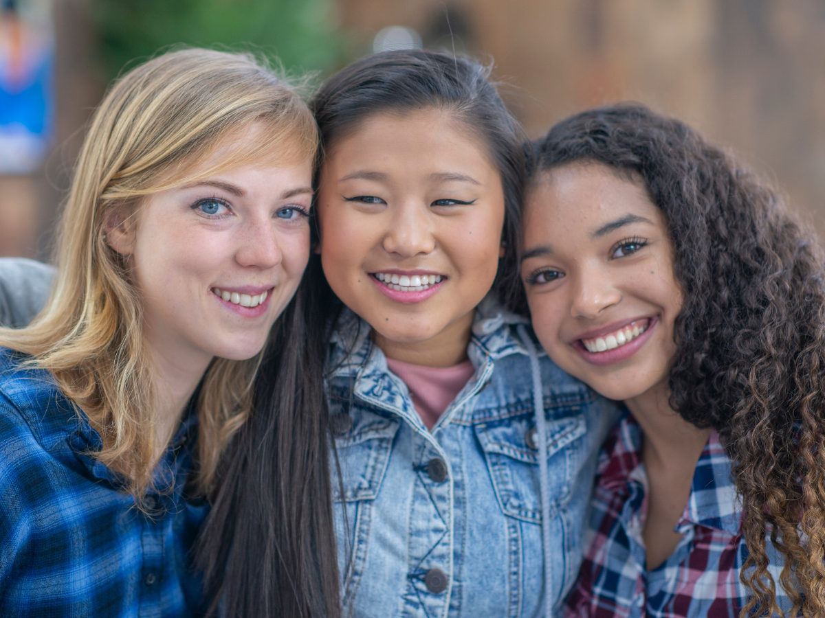 Teen girls posing for a photo